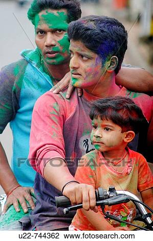 Panjim Goa, India, Indians with colored powder on the face during the Holi feast View Large Photo Image Stock Image - Panjim Goa, India, Indians with colored powder on the face during the Holi feast. Fotosearch