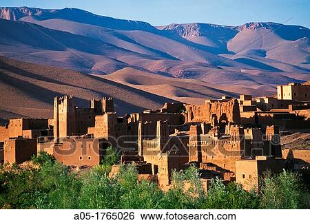 Stock Photograph - Panorama with Ait Arbi Kasbah ruins along the Dades Gorge river of the High Atlas mountains Morocco.. Fotosearch