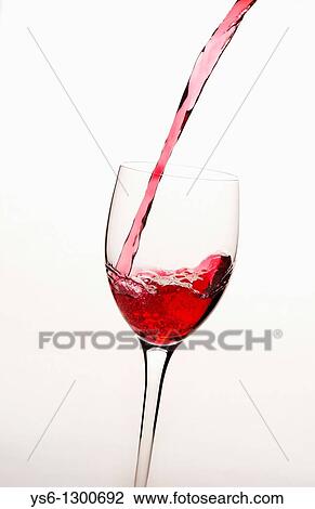 Panzano red wine pouring into a wine glass. View Large Photo Image Stock Image - Panzano red wine pouring into a wine glass.. Fotosearch