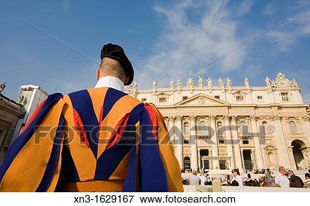 Papal Swiss guard, people waiting celebration with Pope, St Peter's square and St Peter's Basilica Vatican city Rome, Italy View Large Photo Image Stock Photo - Papal Swiss guard, people waiting celebration with Pope, St Peter's square and St Peter's Basilica Vatican city Rome, Italy. Fotosearch