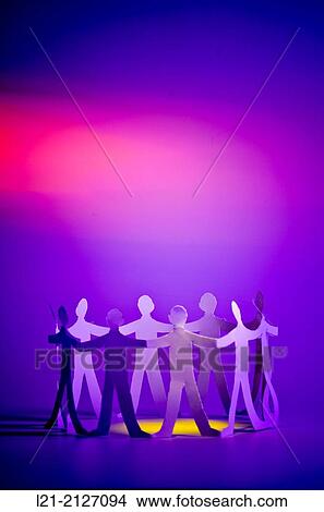 Paper chain people holding hands in a circle. View Large Photo Image Picture - Paper chain people holding hands in a circle.. Fotosearch