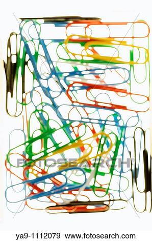 Paper clips on white background View Large Photo Image Stock Photo - Paper clips on white background. Fotosearch