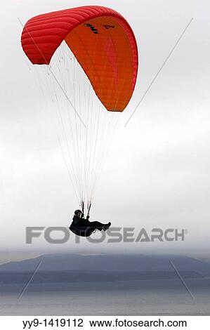 Stock Image - Paraglider - Fort Ebey State Park, Whidbey Island, Washington. Fotosearch