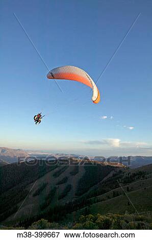 Paragliding in Sun Valley, Idaho. USA View Large Photo Image Stock Photo - Paragliding in Sun Valley, Idaho. USA. Fotosearch