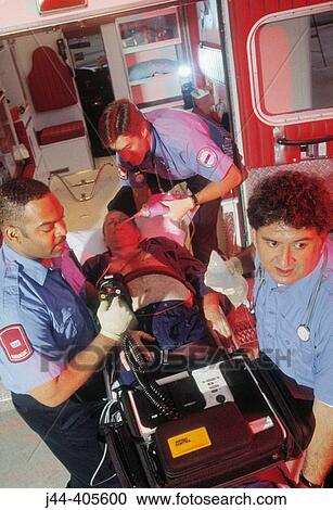 Paramedics rushing patient from ambulance to emergency in hospital View Large Photo Image Stock Image - Paramedics rushing patient from ambulance to emergency in hospital. Fotosearch