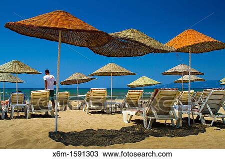 Parasols in Selcuk-Ephesus Pamucak beach Aegean coast Izmir province Turkey View Large Photo Image Stock Image - Parasols in Selcuk-Ephesus Pamucak beach Aegean coast Izmir province Turkey. Fotosearch