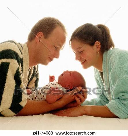 Stock Photo - Parents and baby. Fotosearch