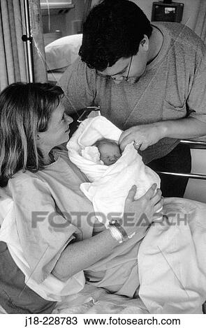 Parents with newborn in hospital View Large Photo Image Stock Image - Parents with newborn in hospital. Fotosearch