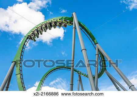 Park guest riding the Incredible Hulk Roller Coaster in Marvel Super Hero Island at Universal Studios Islands of Adventure park. View Large Photo Image Stock Photograph - Park guest riding the Incredible Hulk Roller Coaster in Marvel Super Hero Island at Universal Studios Islands of Adventure park.. Fotosearch