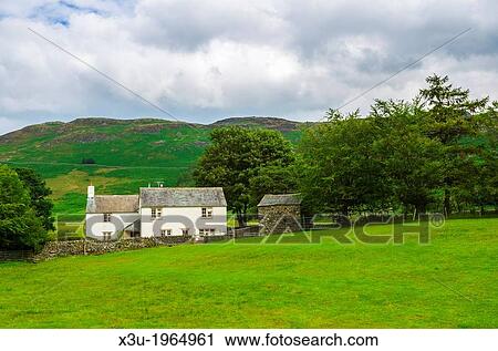 Parkgate Farm at the foot of Gobarrow Fell near Dockray in the Lake District, Cumbria, England. View Large Photo Image Stock Image - Parkgate Farm at the foot of Gobarrow Fell near Dockray in the Lake District, Cumbria, England.. Fotosearch