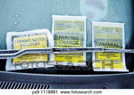 Parking tickets stuck to car window View Large Photo Image Stock Image - Parking tickets stuck to car window. Fotosearch