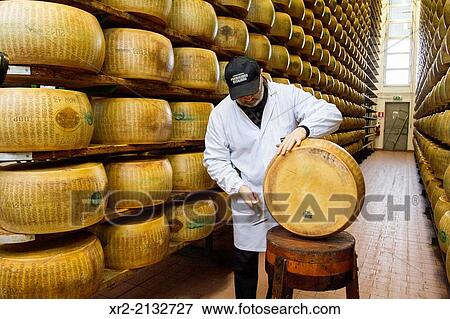 Stock Photo - Parmigiano Reggiano cheese producer factory in Baganzolino, Parma, Emilia Romagna, Italy.. Fotosearch