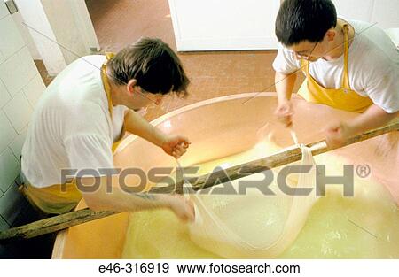 Parmigiano reggiano making. Emilia-Romagna. Italy View Large Photo Image Stock Photo - Parmigiano reggiano making. Emilia-Romagna. Italy. Fotosearch