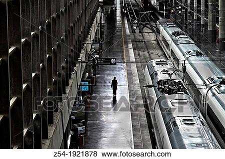 Passanger at Atocha railway station, Madrid, Spain View Large Photo Image Stock Photo - Passanger at Atocha railway station, Madrid, Spain. Fotosearch