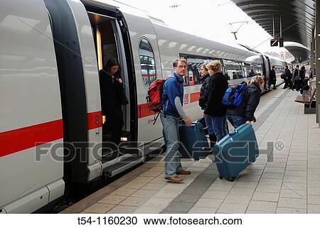 Passengers at the ICE railway station in Ulm View Large Photo Image Stock Image - Passengers at the ICE railway station in Ulm. Fotosearch