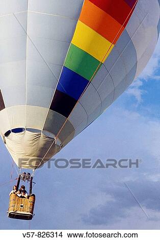 Passengers in a hot air balloon View Large Photo Image Picture - Passengers in a hot air balloon. Fotosearch