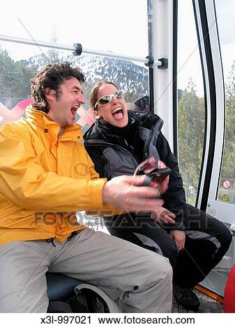 Passengers into cable car Pyrenees Andorra View Large Photo Image Stock Image - Passengers into cable car Pyrenees Andorra. Fotosearch