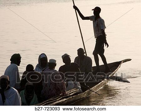 Passengers on pirogue, Niger River, Niafunk?. Mali View Large Photo Image Stock Image - Passengers on pirogue, Niger River, Niafunk?. Mali. Fotosearch