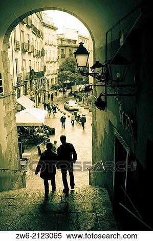 Passing couple at Plaza Mayor, Madrid, Spain View Large Photo Image Stock Photography - Passing couple at Plaza Mayor, Madrid, Spain. Fotosearch