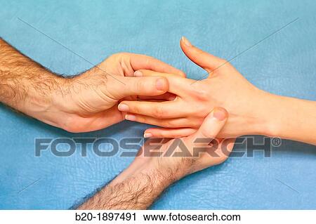 Passive mobilization of metacarpo phalangeal joint of the second finger Physiotherapy medical center, Donostia, San Sebastian, Gipuzkoa, Basque Country, Spain View Large Photo Image Stock Image - Passive mobilization of metacarpo phalangeal joint of the second finger Physiotherapy medical center, Donostia, San Sebastian, Gipuzkoa, Basque Country, Spain. Fotosearch