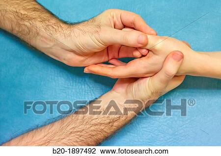 Passive mobilization of metacarpophalangeal joint of the big toe Physiotherapy medical center, Donostia, San Sebastian, Gipuzkoa, Basque Country, Spain View Large Photo Image Stock Image - Passive mobilization of metacarpophalangeal joint of the big toe Physiotherapy medical center, Donostia, San Sebastian, Gipuzkoa, Basque Country, Spain. Fotosearch