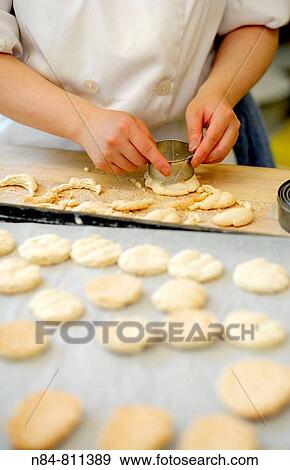 Pastry chef making small pastries View Large Photo Image Stock Photo - Pastry chef making small pastries. Fotosearch