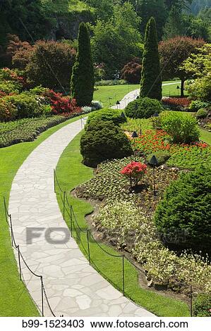 PATHWAY SUNKEN GARDEN BUTCHART GARDENS VICTORIA ISLAND BRITISH COLUMBIA CANADA View Large Photo Image Stock Image - PATHWAY SUNKEN GARDEN BUTCHART GARDENS VICTORIA ISLAND BRITISH COLUMBIA CANADA. Fotosearch