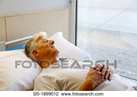 patient in hospital room, Onkologikoa Hospital, Oncology Institute, Case Center for prevention, diagnosis and treatment of cancer, Donostia, San Sebastian, Gipuzkoa, Basque Country, Spain View Large Photo Image Stock Image - patient in hospital room, Onkologikoa Hospital, Oncology Institute, Case Center for prevention, diagnosis and treatment of cancer, Donostia, San Sebastian, Gipuzkoa, Basque Country, Spain. Fotosearch