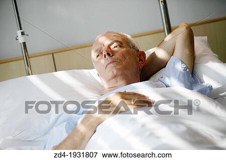 Patient in hospital room, Onkologikoa Hospital, Oncology Institute, Case Center for prevention, diagnosis and treatment of cancer, Donostia, San Sebastian, Gipuzkoa, Basque Country, Spain View Large Photo Image Stock Photo - Patient in hospital room, Onkologikoa Hospital, Oncology Institute, Case Center for prevention, diagnosis and treatment of cancer, Donostia, San Sebastian, Gipuzkoa, Basque Country, Spain. Fotosearch