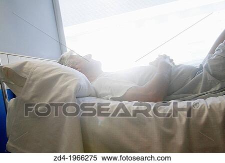 Patient in hospital room, Onkologikoa Hospital, Oncology Institute, Case Center for prevention, diagnosis and treatment of cancer, Donostia, San Sebastian, Gipuzkoa, Basque Country, Spain View Large Photo Image Stock Photography - Patient in hospital room, Onkologikoa Hospital, Oncology Institute, Case Center for prevention, diagnosis and treatment of cancer, Donostia, San Sebastian, Gipuzkoa, Basque Country, Spain. Fotosearch