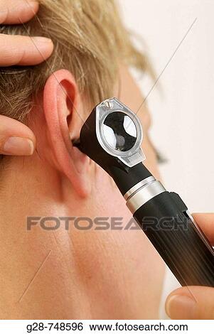 Patient with hearing problems, examined by otorhinolaryngologist View Large Photo Image Stock Photograph - Patient with hearing problems, examined by otorhinolaryngologist. Fotosearch