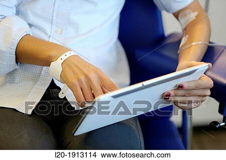 Patient with tablet, Box chemotherapy, Onkologikoa Hospital, Oncology Institute, Case Center for prevention, diagnosis and treatment of cancer, Donostia, San Sebastian, Gipuzkoa, Basque Country, Spain View Large Photo Image Picture - Patient with tablet, Box chemotherapy, Onkologikoa Hospital, Oncology Institute, Case Center for prevention, diagnosis and treatment of cancer, Donostia, San Sebastian, Gipuzkoa, Basque Country, Spain. Fotosearch