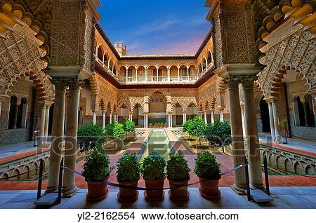 Picture - Patio de las Doncellas (Courtyard of the Maidens) an Italian Renaissance courtyard (1540-72) with Arabesque Mud? jar style plaster work, Alcazar of Seville, Seville, Spain.. Fotosearch