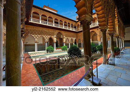 Patio de las Doncellas (Courtyard of the Maidens) an Italian Renaissance courtyard (1540-72) with Arabesque Mud? jar style plaster work, Alcazar of Seville, Seville, Spain. View Large Photo Image Stock Image - Patio de las Doncellas (Courtyard of the Maidens) an Italian Renaissance courtyard (1540-72) with Arabesque Mud? jar style plaster work, Alcazar of Seville, Seville, Spain.. Fotosearch