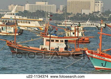 Pattaya (Thailand): fishing boats in the Pattaya Bay View Large Photo Image Picture - Pattaya (Thailand): fishing boats in the Pattaya Bay. Fotosearch