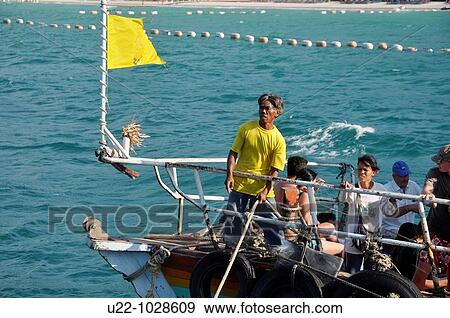 Pattaya (Thailand), tourists coming back from Koh Larn island View Large Photo Image Stock Photo - Pattaya (Thailand), tourists coming back from Koh Larn island. Fotosearch
