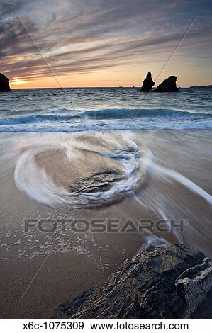Patterns in the tide at Porthcothan Bay, Cornwall England UK View Large Photo Image Stock Photo - Patterns in the tide at Porthcothan Bay, Cornwall England UK. Fotosearch