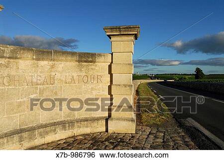 Pauillac France Chateau Latour boundary and the village of St Julien Beychevelle in the distance View Large Photo Image Stock Photograph - Pauillac France Chateau Latour boundary and the village of St Julien Beychevelle in the distance. Fotosearch