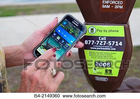 Stock Image - Pay by phone automobile parking meter.. Fotosearch