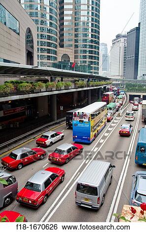 Peak hour traffic on Connaught Rd, a main highway through downtown Hong Kong This street used to be along the waterfront, but land reclamation has now cut it off from the harbour View Large Photo Image Stock Photograph - Peak hour traffic on Connaught Rd, a main highway through downtown Hong Kong This street used to be along the waterfront, but land reclamation has now cut it off from the harbour. Fotosearch