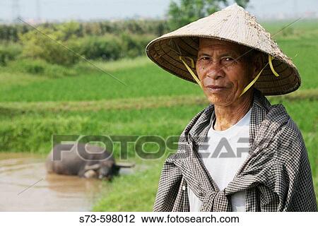 Peasant. Vietnam View Large Photo Image Stock Image - Peasant. Vietnam. Fotosearch