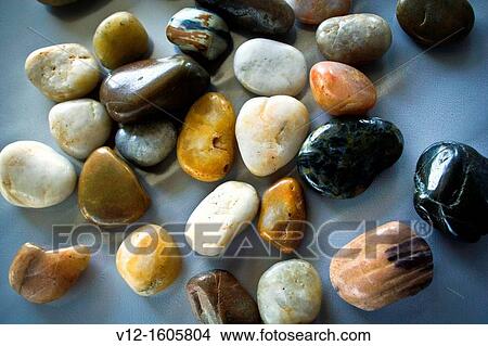 Pebbles in different colors View Large Photo Image Picture - Pebbles in different colors. Fotosearch