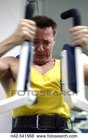 Pectoral press weight machine, Abu Dhabi, United Arab Emirates View Large Photo Image Stock Photo - Pectoral press weight machine, Abu Dhabi, United Arab Emirates. Fotosearch