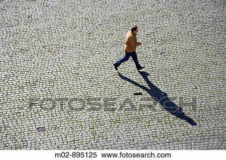 pedestrian in front of The Coliseum in Rome, Italy View Large Photo Image Stock Photography - pedestrian in front of The Coliseum in Rome, Italy. Fotosearch