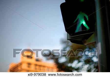 Pedestrian sign on a traffic light, Seville, Spain View Large Photo Image Stock Photo - Pedestrian sign on a traffic light, Seville, Spain. Fotosearch
