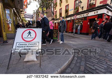 Pedestrianized Zone sign in English and Irish, Temple Bar, Dublin, Ireland View Large Photo Image Stock Image - Pedestrianized Zone sign in English and Irish, Temple Bar, Dublin, Ireland. Fotosearch