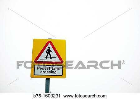 Stock Image - Pedestrians crossing, urban symbolism. Fotosearch