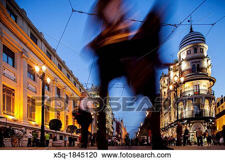 Pedestrians on Constitution Avenue, Seville, Spain View Large Photo Image Stock Image - Pedestrians on Constitution Avenue, Seville, Spain. Fotosearch