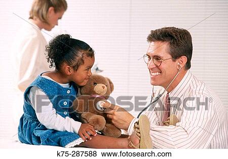 Pediatric doctor, patient, and teddy bear View Large Photo Image Stock Photo - Pediatric doctor, patient, and teddy bear. Fotosearch
