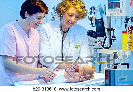 Pediatrician and nurse examinating baby at hospital View Large Photo Image Stock Photo - Pediatrician and nurse examinating baby at hospital. Fotosearch